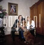 11-01-2003 Familie Paay Curry Patricia Paay, Adam Curry and Christina at home  in Belgium. January 11, 2003.

[keywords]Posed, Smiling, Dogs[/keywords]